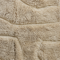 Close-up of the thick cream wool pile on the HKLIVING wool rug limitless