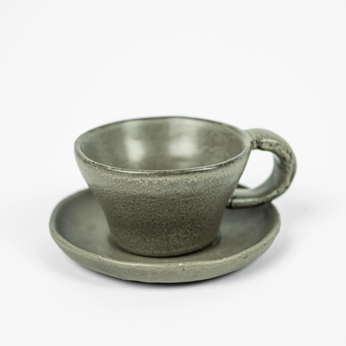 Tuva taupe ceramic cup and saucer with reactive glaze by Olsson & Jensen