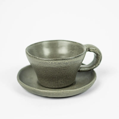 Tuva taupe ceramic cup and saucer with reactive glaze by Olsson & Jensen