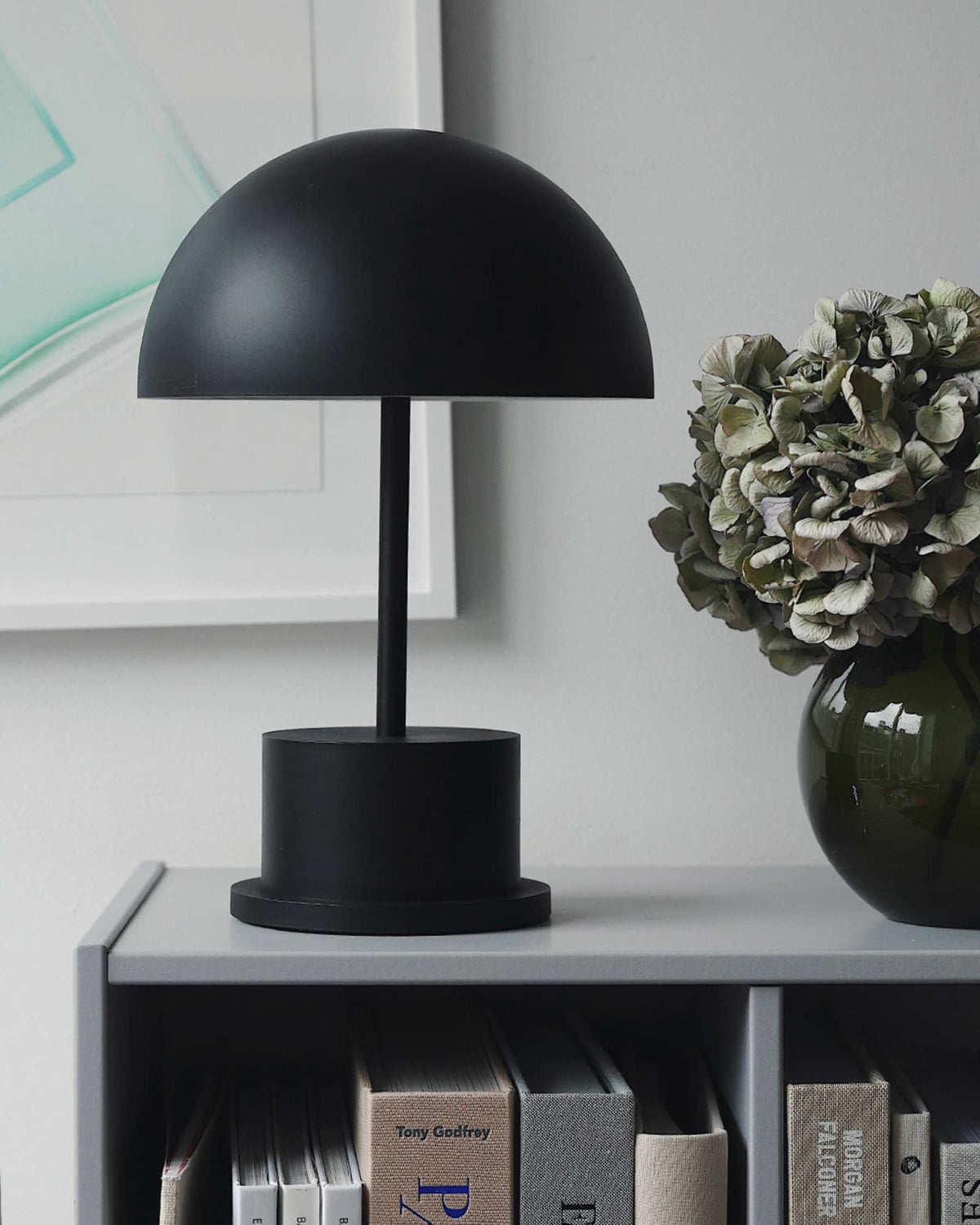 modern black portable lamp adding soft light to a contemporary interior
