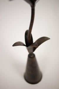 Close-up of the leaves and base of the Vireo candlestick by Olsson & Jensen