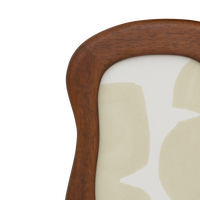 Close-up of the Wido frame's curved mango wood edge