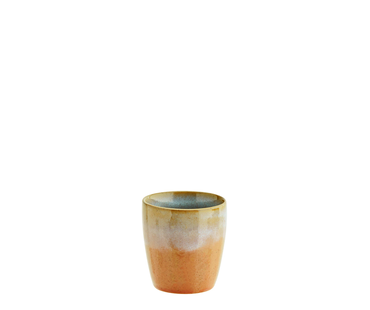 Ceramic mug with a gradient finish on a white background
