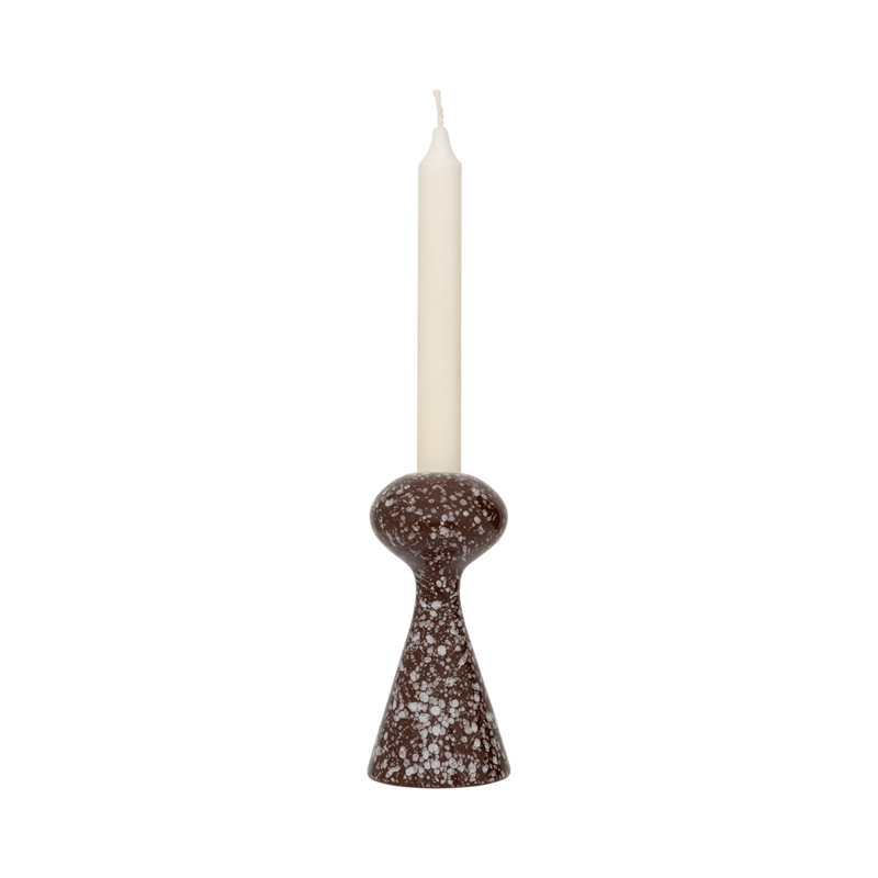 Zaria candle holder with an ivory dinner candle