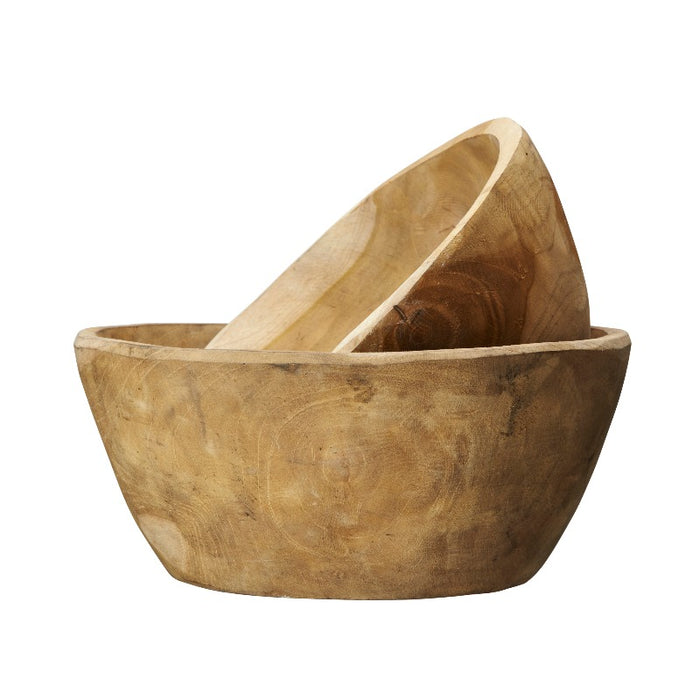 2 of the wooden bowls, one inside the other at a dangerous angle