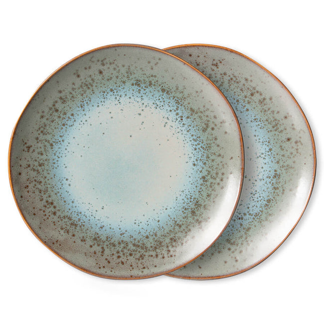with an almost glowing light blue taking up the main centre of this set of 2 plates gong out to the brown speckled blueish green before finishing with a brown rim almost like the beginning of the universe by hkliving