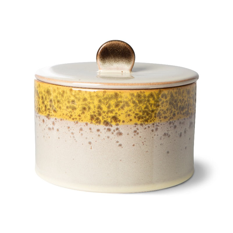 Cookie jar by itself: beig and yellow with brown spots