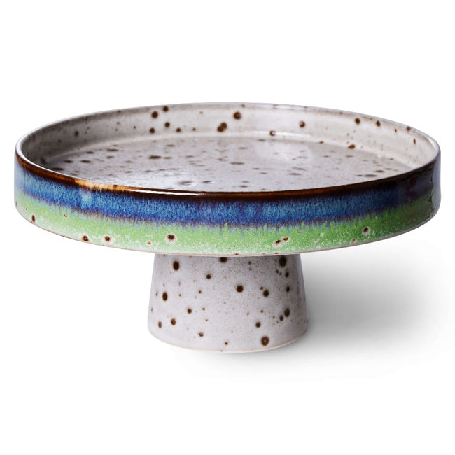 stunning 70s inspired cake stand or plate on a tapered foot if you will from hkliving with hand glazed details in brown with a blue and green striped ridge to the outer edge of the plate