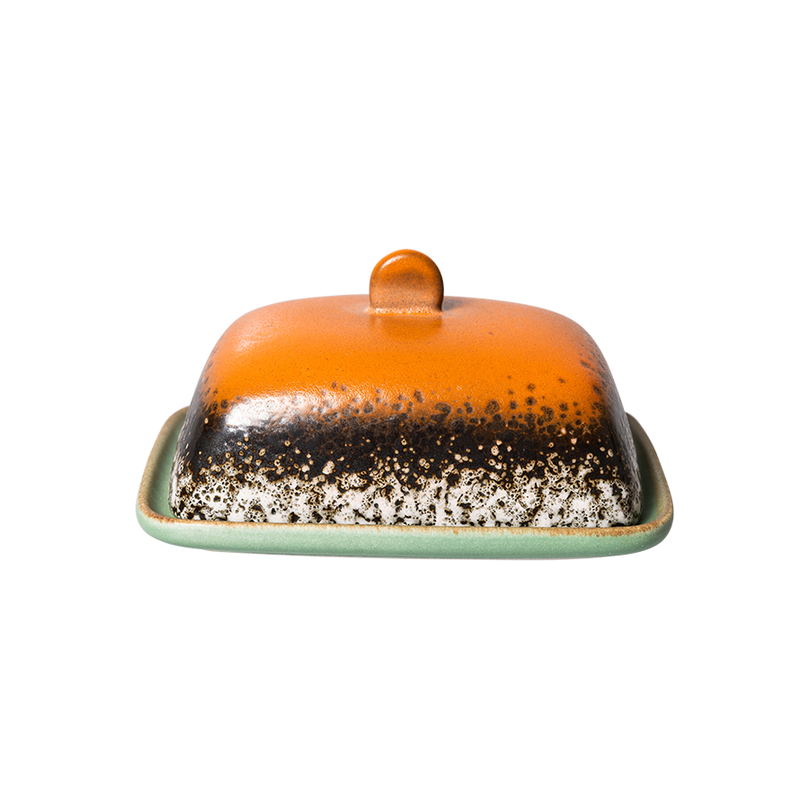 meteor butter dish with it's orange top and green base plate