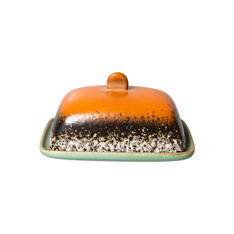 meteor butter dish with it's orange top and green base plate