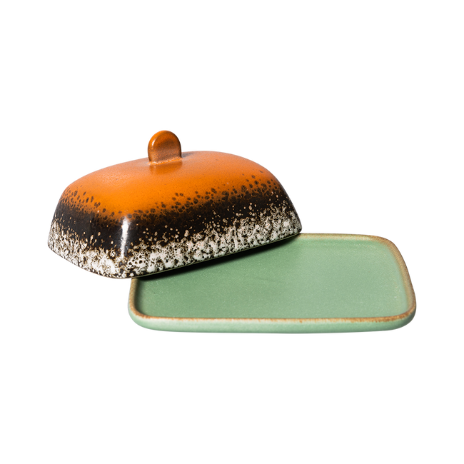 Meteor butter dish with its orange top cover and light green base