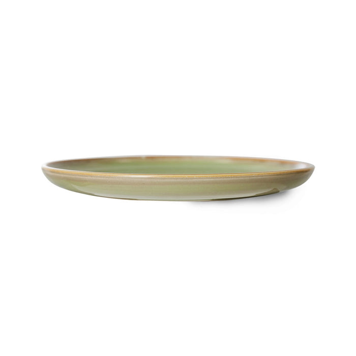 as each is hand painted, each plate is different which is even visible in this side on view of the green plate showing that even the underside is as cooourful as the top