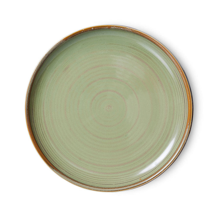 with visible brush strokes of pink, and brown on this largely green plate which run full circles thanks to HKlivings design