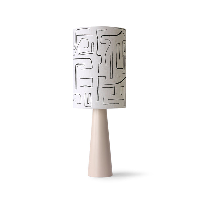 floor standing beige lamp with large cylinfrical lamp shade in white with artistic lines and squiggles showing off its dutch herritage from hkliving