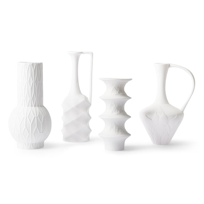set of 4 white hkliving vases all with very different styles and designs but all pure white ceramic